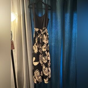 Black Tropical Print Long Pant Romper with Belted Waist. 1XL